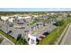 Aerial of a Wellen Park shopping center with Publix and Ross, surrounded by an extensive parking lot at 8784 Mystic Cir, North Port, FL 34287