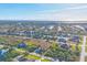 Breathtaking aerial view of a residential neighborhood near a tranquil waterway at 9219 Newnan Cir, Port Charlotte, FL 33981