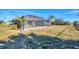 A sprawling backyard showcasing a screened-in pool and patio, offering a serene oasis for outdoor enjoyment at 9219 Newnan Cir, Port Charlotte, FL 33981