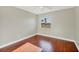 Bedroom features hardwood floors and a window at 9219 Newnan Cir, Port Charlotte, FL 33981