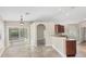 Bright, spacious living area featuring tile floors and a seamless transition to outdoor patio at 9219 Newnan Cir, Port Charlotte, FL 33981