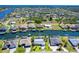 Stunning aerial view of waterfront homes and intersecting canals, perfect for boating, fishing and enjoying the Florida lifestyle at 9330 Migue Cir, Port Charlotte, FL 33981