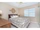 Cozy bedroom featuring neutral colors, natural light, and a comfortable bed at 9330 Migue Cir, Port Charlotte, FL 33981