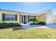Attractive home featuring manicured landscaping, creating a great first impression and curb appeal at 9330 Migue Cir, Port Charlotte, FL 33981