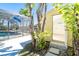 Exterior view of shed with pool access in backyard at 9330 Migue Cir, Port Charlotte, FL 33981