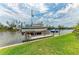 A sturdy boat lift provides easy access to the water for boating and fishing enthusiasts at 10640 Ayear Rd, Port Charlotte, FL 33981