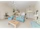 Inviting living room with vaulted ceilings, comfortable seating, and an open layout at 10640 Ayear Rd, Port Charlotte, FL 33981