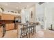 Bright and airy kitchen with a breakfast bar, stainless steel appliances, and an open layout at 1104 Yosemite Dr, Englewood, FL 34223