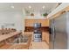 Kitchen featuring granite countertops, stainless steel appliances, and ample cabinet space at 1104 Yosemite Dr, Englewood, FL 34223