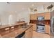 Kitchen with granite countertops, stainless steel appliances, and plenty of storage space at 1104 Yosemite Dr, Englewood, FL 34223