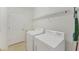 Efficient laundry room with modern washer and dryer units, providing convenience for everyday chores at 1104 Yosemite Dr, Englewood, FL 34223