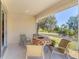 Inviting patio with comfortable seating provides a serene space to enjoy the outdoors and entertain guests at 1104 Yosemite Dr, Englewood, FL 34223