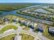 Scenic aerial view of waterfront homes with private docks and beautiful landscaping along canals at 14564 Gaspar Loop, Port Charlotte, FL 33981