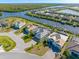 Scenic aerial view of waterfront homes with private docks and beautiful landscaping along canals at 14564 Gaspar Loop, Port Charlotte, FL 33981