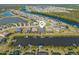 Aerial view of waterfront homes in a community with canals and lush landscaping at 14564 Gaspar Loop, Port Charlotte, FL 33981