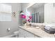 Well-lit bathroom with granite countertops, stylish decor, and fresh, modern finishes at 14564 Gaspar Loop, Port Charlotte, FL 33981
