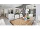 Dining area features decorative table setting and kitchen access at 14564 Gaspar Loop, Port Charlotte, FL 33981