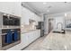 Modern kitchen boasts stainless steel appliances, granite counters and ample cabinet space at 14564 Gaspar Loop, Port Charlotte, FL 33981