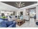 Spacious living room with open concept layout flowing into the kitchen area at 14564 Gaspar Loop, Port Charlotte, FL 33981