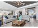 Spacious living area flowing into the kitchen and foyer offers ample seating and stylish decor at 14564 Gaspar Loop, Port Charlotte, FL 33981