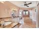 A spa-like bathroom with double vanities, granite countertops, and a soaking tub at 14810 Ingraham Blvd, Port Charlotte, FL 33981