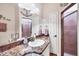 Bathroom features granite countertops, a glass-enclosed shower, and nautical-themed decor at 14810 Ingraham Blvd, Port Charlotte, FL 33981