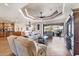 Inviting living room with tile floors, a modern fan, and access to an outdoor area with scenic views at 14810 Ingraham Blvd, Port Charlotte, FL 33981