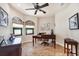 A stylish office with ample natural light and stained glass window features at 14810 Ingraham Blvd, Port Charlotte, FL 33981