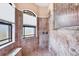 Elegant shower features mosaic tile, shower head, glass door, and window at 14810 Ingraham Blvd, Port Charlotte, FL 33981