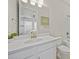 Clean bathroom featuring single sink with white countertops, tub, and toilet at 1607 Laurel Brook Ln, Port Charlotte, FL 33953