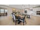 Open concept dining room with views of the modern white kitchen at 1607 Laurel Brook Ln, Port Charlotte, FL 33953