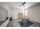 Simple exercise room with rubber flooring, free weights, and dresser at 1607 Laurel Brook Ln, Port Charlotte, FL 33953