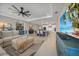 Open-concept living room featuring recessed lighting and a ceiling fan at 1607 Laurel Brook Ln, Port Charlotte, FL 33953