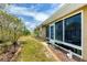 Backyard with meticulous landscaping offers serene views and enhances outdoor living experience at 182 Rotonda W Blvd # B, Rotonda West, FL 33947