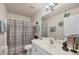 Neutral-toned bathroom with tub and shower combo at 182 Rotonda W Blvd # B, Rotonda West, FL 33947