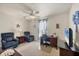 Spacious spare bedroom or office space with fan, recliners and desk at 182 Rotonda W Blvd # B, Rotonda West, FL 33947