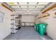 A clean and spacious garage area provides ample parking and storage space for vehicles and belongings at 182 Rotonda W Blvd # B, Rotonda West, FL 33947