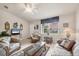 Inviting living room with comfortable seating, tile floors and abundant natural light at 182 Rotonda W Blvd # B, Rotonda West, FL 33947