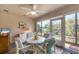 Cozy sunroom featuring large windows offering natural light at 182 Rotonda W Blvd # B, Rotonda West, FL 33947