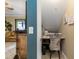 Cozy home office featuring a custom desk and charming chair, perfect for a quiet workspace at 20279 Lagente Cir, Venice, FL 34293