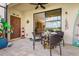 Welcoming screened patio with outdoor dining set, providing a comfortable space for relaxation and dining at 20279 Lagente Cir, Venice, FL 34293