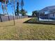 Spacious backyard with a pool and a high privacy fence at 2259 Lee Ter, Port Charlotte, FL 33952