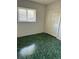 Bedroom featuring a window, closet and green-marbled flooring at 2259 Lee Ter, Port Charlotte, FL 33952