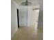 Hallway area featuring white walls, a light fixture, with light colored floors at 2259 Lee Ter, Port Charlotte, FL 33952