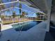 A screened-in pool featuring a clean deck and clear water at 2259 Lee Ter, Port Charlotte, FL 33952