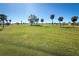 Scenic view of a beautiful and wide open golf course at 235 Caddy Rd, Rotonda West, FL 33947