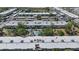 This condo features an outdoor community pool, beautiful trees, and a well maintained exterior at 2437 Harbor Blvd # 204, Port Charlotte, FL 33952