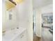 Bathroom with a white vanity and grey flooring at 2437 Harbor Blvd # 204, Port Charlotte, FL 33952
