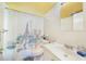 Bathroom featuring a tub shower, white vanity, and grey flooring at 2437 Harbor Blvd # 204, Port Charlotte, FL 33952