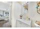 Bathroom with white vanity and access to the bedroom at 2437 Harbor Blvd # 204, Port Charlotte, FL 33952